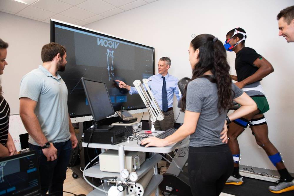 JU Student performing a physical on a treadmill.